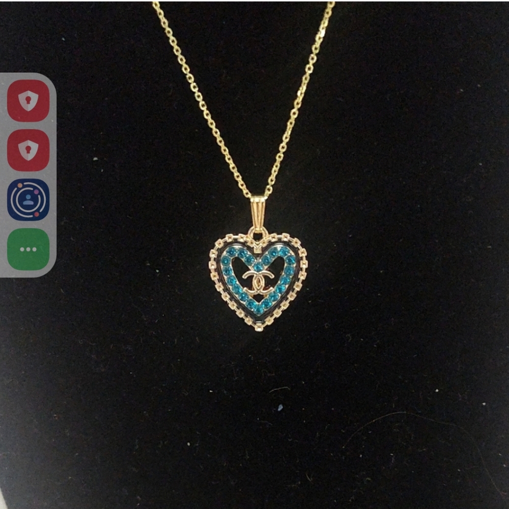 CHANEL Gold Heart Pendant Necklace with Blue Crystals
